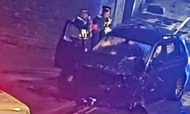 Police at Constitution Street in Dundee.