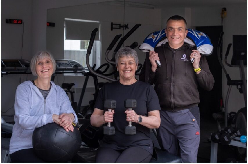 Chris and two of his clients after a functional fitness training session in his Birkhill gym. Image: Chris Neilson