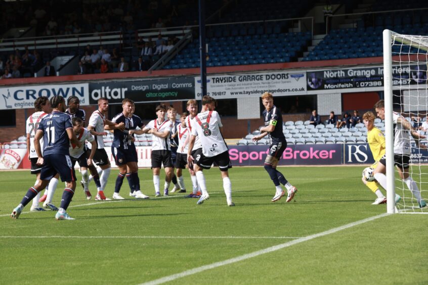 Billy Koumetio sees Rhys McCabe block his goal-bound header on the line. Image: David Young/Action Plus/Shutterstock