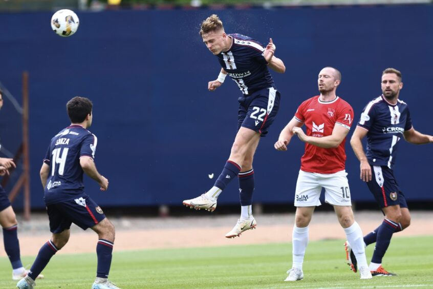 Luke Graham wins a header for Dundee
