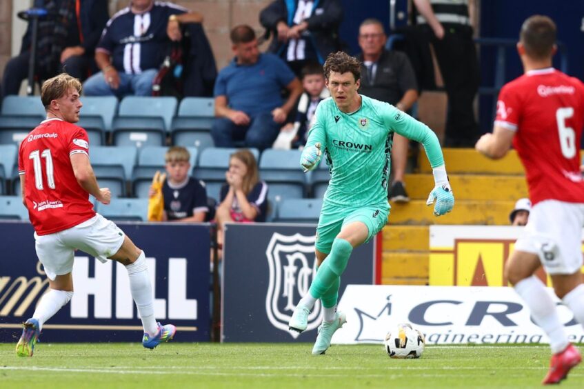 Under-pressure Jon McCracken showing his ability on the ball against Montrose. Image: David Young/Action Plus/Shutterstock
