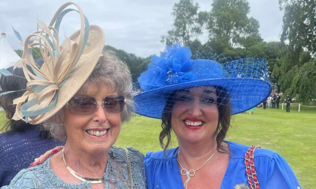Evelyn Goodwillie and Kayti Masson wearing fabulous hats
