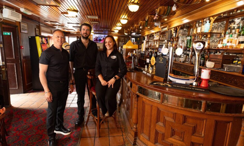 John with chef Louis Sherrit and manager Sharon Monaghan.