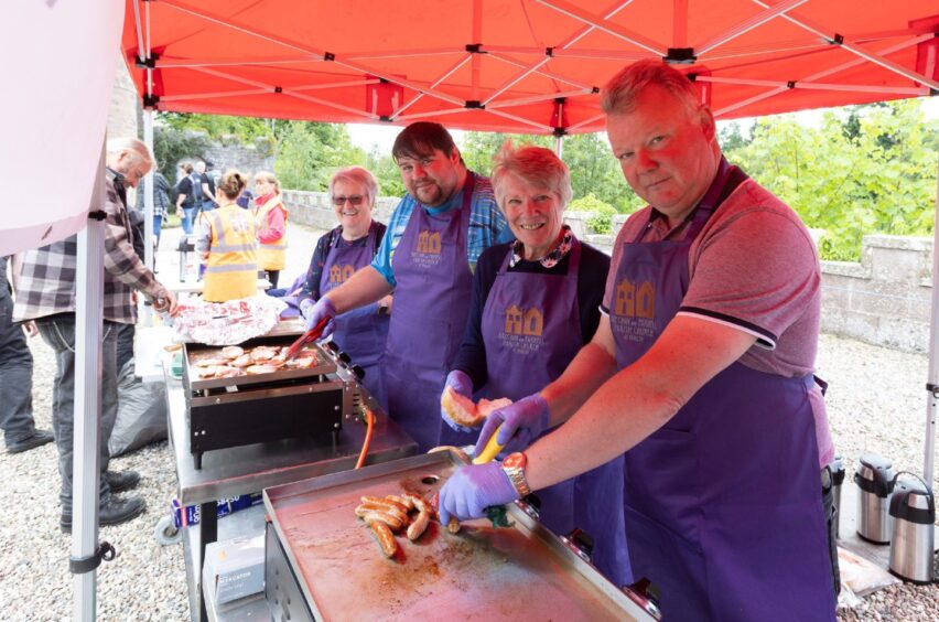 Brechin and Farnell Parish Church volunteers cooking and serving food at the 2025 Brechin Bike and Trike Fest at Brechin Castle.