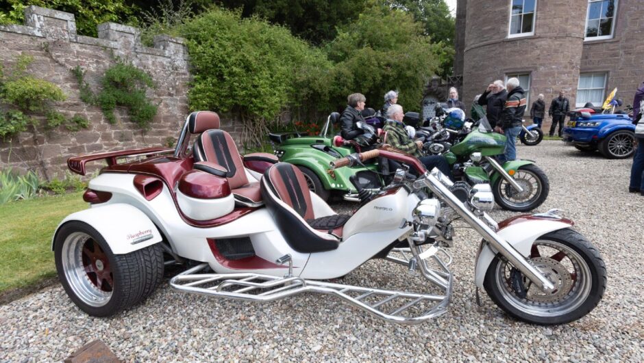 Custom-built trike called Raspberry on display during the 2025 Brechin Bike and Trike Fest at Brechin Castle in Angus, Scotland.