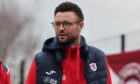 Callum Fordyce, wearing glasses, before a Raith Rovers game.