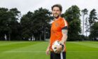 Will Ferry poses for snaps at United's St Andrew's training centre