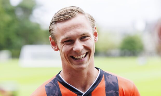 All smiles: Bert Esselink settles into life in Scotland