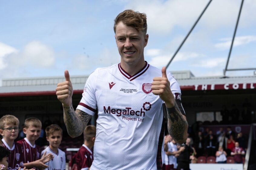 All smiles: David Gold, alongside co-manager Colin Hamilton, led Arbroath to promotion last term