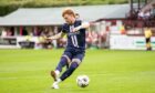 Dundee talisman Simon Murray strokes home a penalty at Brechin. Image: Ross Parker/SNS
