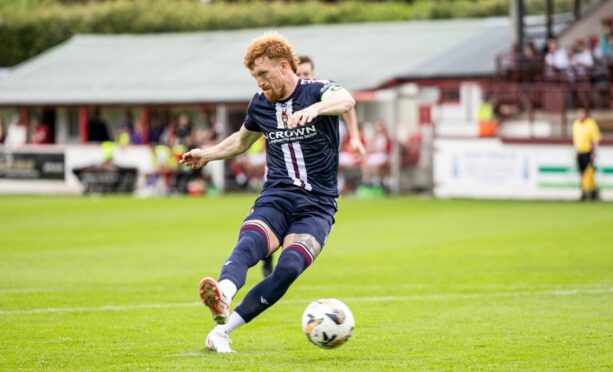Dundee talisman Simon Murray strokes home a penalty at Brechin. Image: Ross Parker/SNS