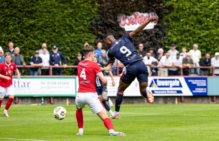 Emile Acquah scores