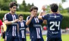Dundee trialist Jose Urias (R) celebrates with Victor Lopez (C) and Jorge Landeros (L) after scoring to make it 3-0 at Brechin. Image: Ross Parker/SNS