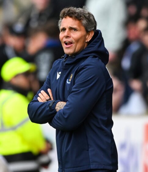St Johnstone boss Simo Valakari with his arms folded on the touchline.