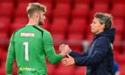 Toby Steward shakes hands with Simo Valakari at the end of the Falkirk game.