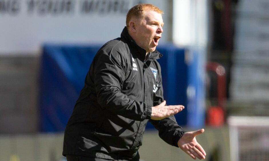 DAFC boss Neil Lennon shouts instructions from the sidelines against Hearts.