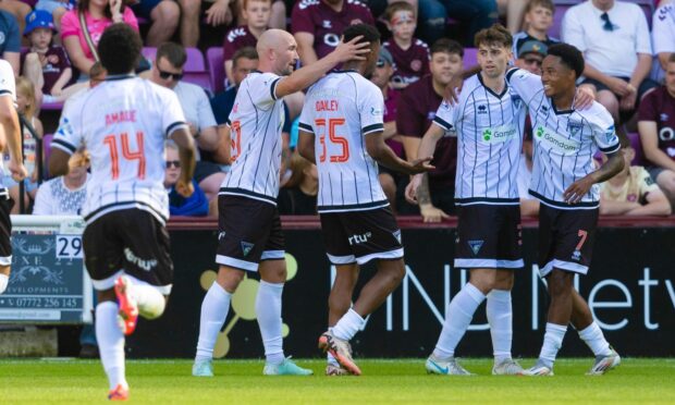 The Dunfermline Athletic players celebrate Josh Cooper's goal against Hearts.