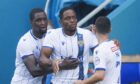 Uche Ikpeazu celebrates his goal in Inverness.