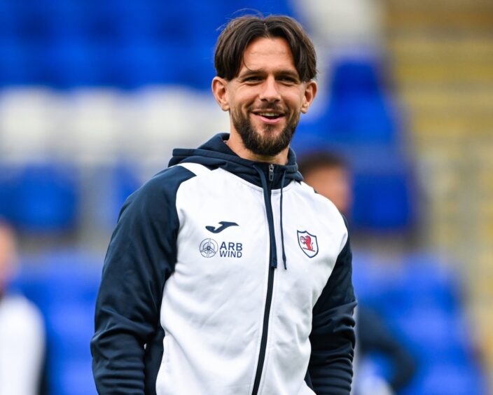 Dylan Easton smiles as he arrives for Raith Rovers' cup meeting with St Johnstone at McDiarmid Park.