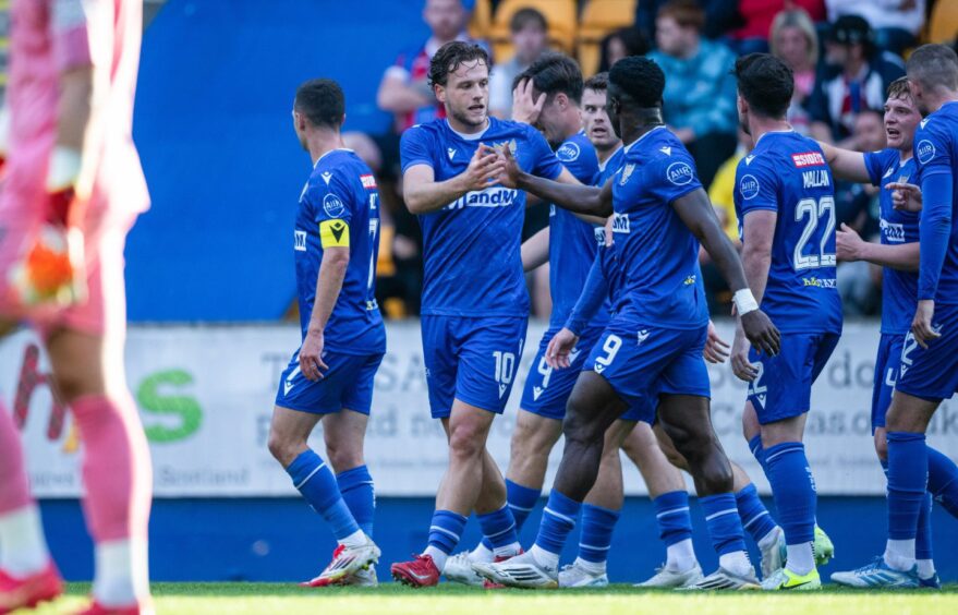 Jamie Gullan celebrates with his team-mates after scoring St Johnstone's opening goal in the win over old club Raith Rovers.