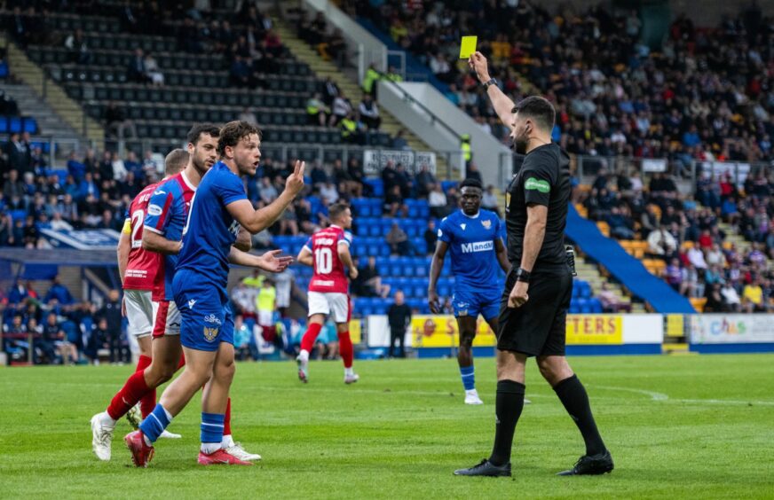 St Johnstone striker Jamie Gullan appeals to the referee as he is shown a yellow card for a 'dive' against Raith Rovers.