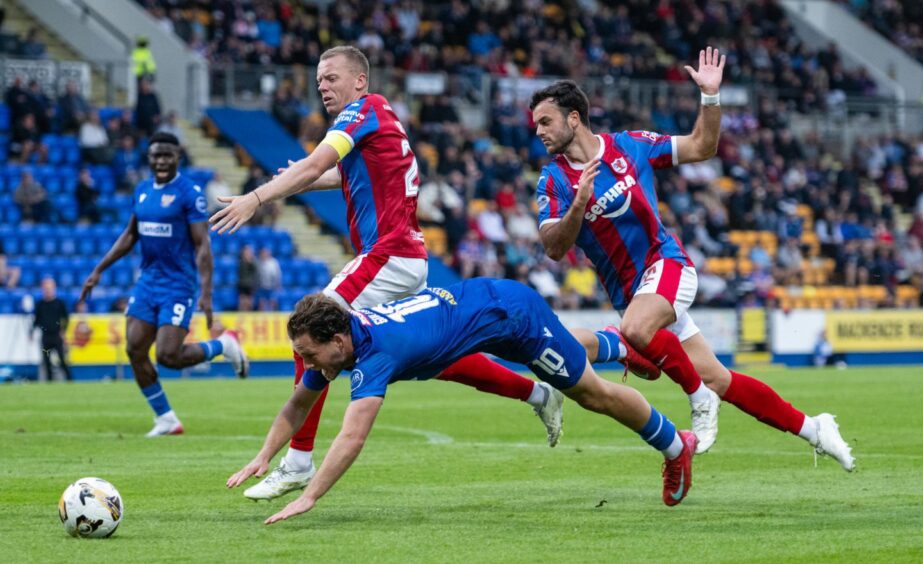 Jamie Gullan falls under the collective challenge of Raith Rovers duo Scott Brown and Jordan Doherty.