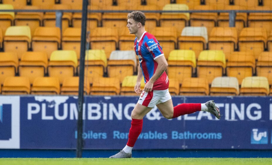 Jack Hamilton runs away after scoring for Raith Rovers against St Johnstone.