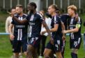 Dundee celebrate their win over Bonnyrigg Rose. Image: Ross Parker/SNS