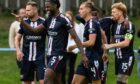 Dundee celebrate their win over Bonnyrigg Rose. Image: Ross Parker/SNS