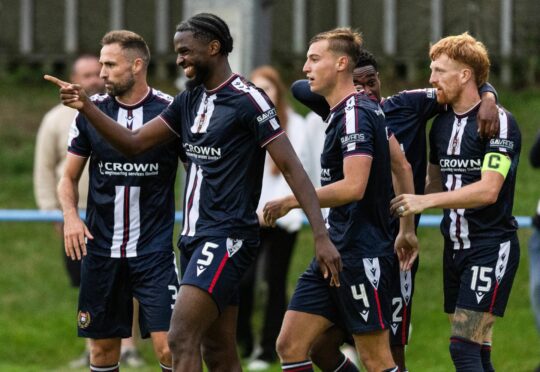 Dundee celebrate their win over Bonnyrigg Rose. Image: Ross Parker/SNS