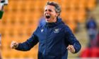 St Johnstone boss Simo Valakari clenches his fists and roars with delight.