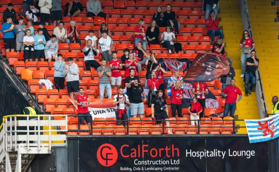 The travelling Strassen fans watched their side put up a good display.