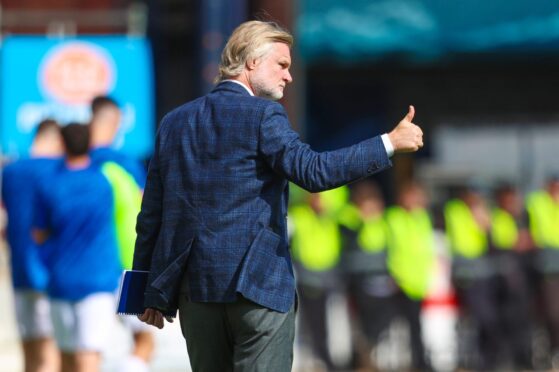 Thumbs up from Steven Pressley - but he wasn't pleased with everything from his Dundee side. Image: Ross MacDonald/SNS