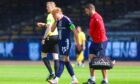 Simon Murray limps off against Montrose. Image: Ross MacDonald/SNS
