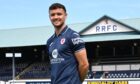 Ross Matthews stands at Stark's Park in Raith Rovers' new 2025/26 kit.