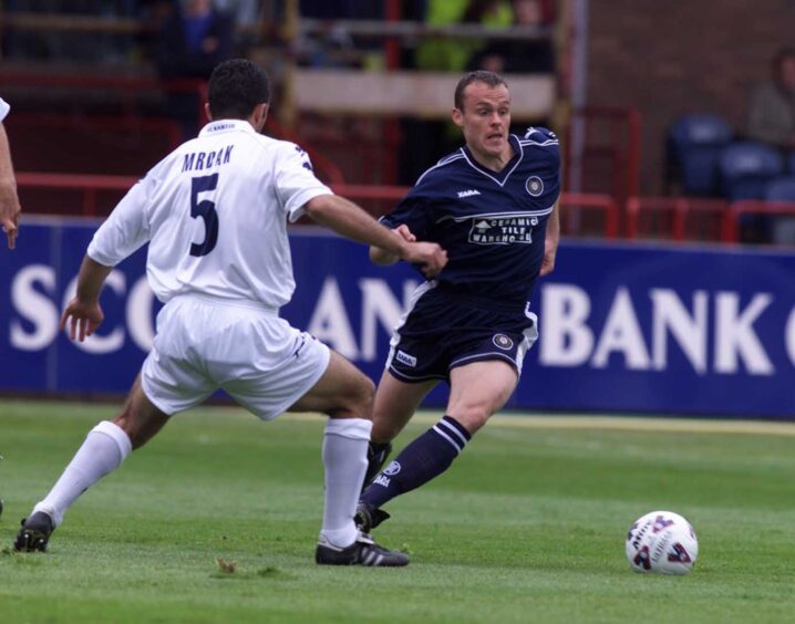 Mark Robertson during his Dundee days, facing FK Sartid. Image: SNS