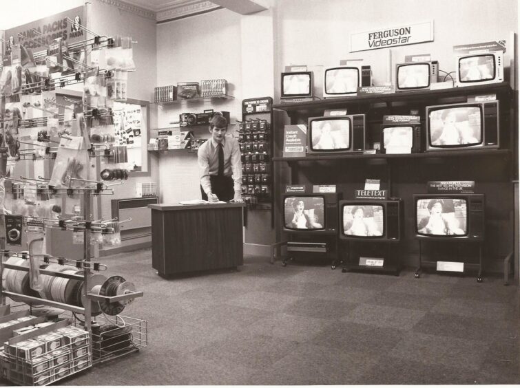 Alex Carswell in his electrical shop in1986.