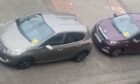 Cars parked on Arklay Terrace.