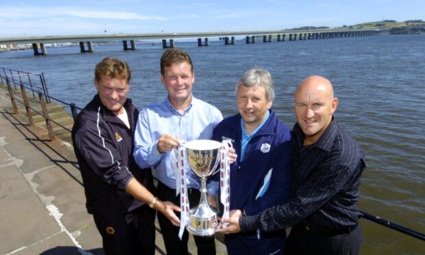 Glenn Hoddle, Gordon Chisholm, Paul Sturrock and Jim Duffy with the City of Discovery Cup. Image: DC Thomson.