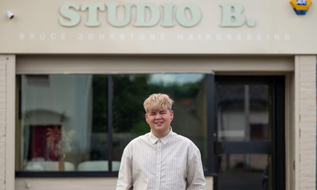 Bruce Johnstone outside his Dundee salon, Studio B.