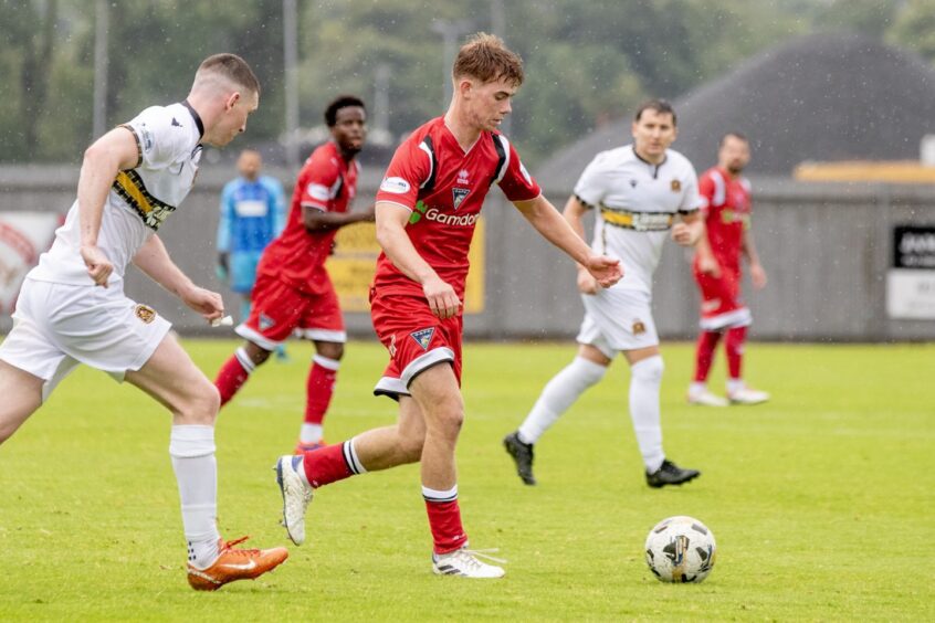 Keith Bray gets on the ball for the Pars against Dumbarton.