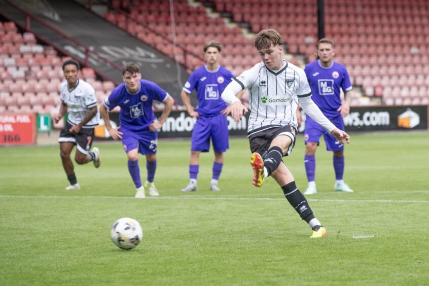 Rory MacLeod sweeps in his penalty for the Pars.