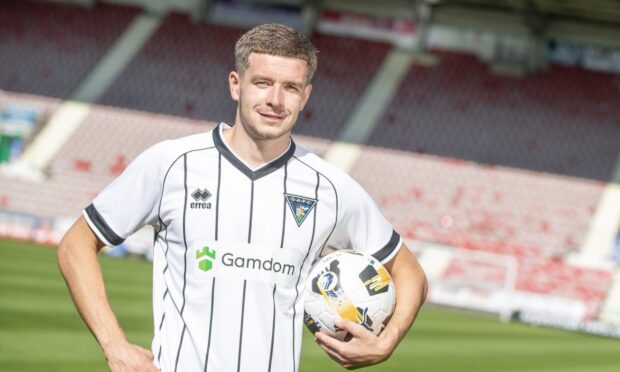 Dunfermline Athletic midfielder Charlie Gilmour in the new 2025/26 home kit.