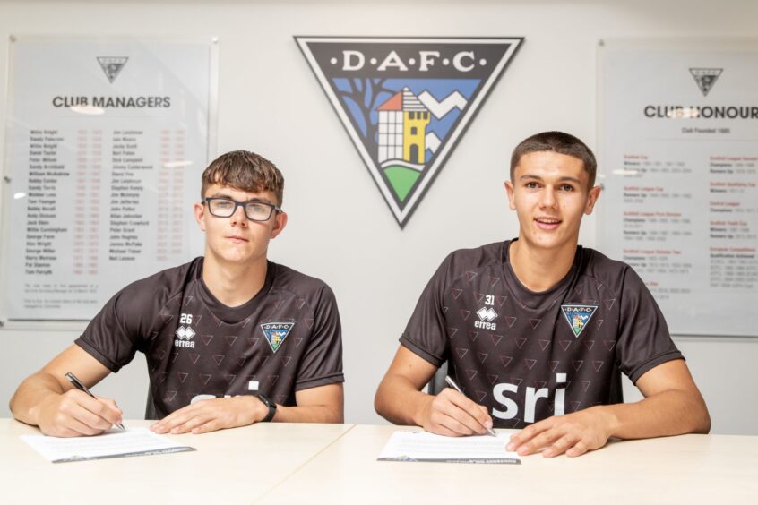 Brothers Andrew and John Tod put pen to paper on their new contracts at Dunfermline Athletic.