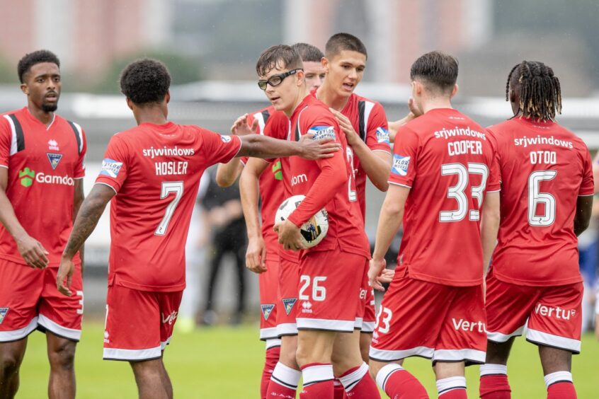 Andrew Tod is surrounded by Dunfermline team-mates as he celebrates scoring for the Pars.