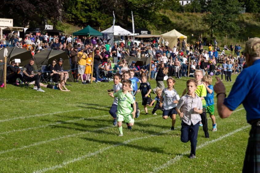Small boys running race at Highland Games