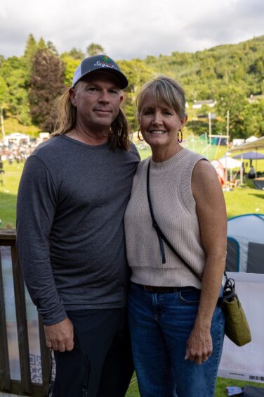 Couple arm in arm at Kenmore Highland Games