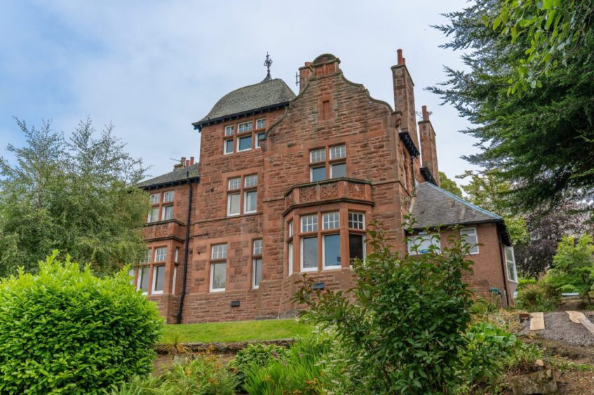 The handsome sandstone building dates from 1898.
