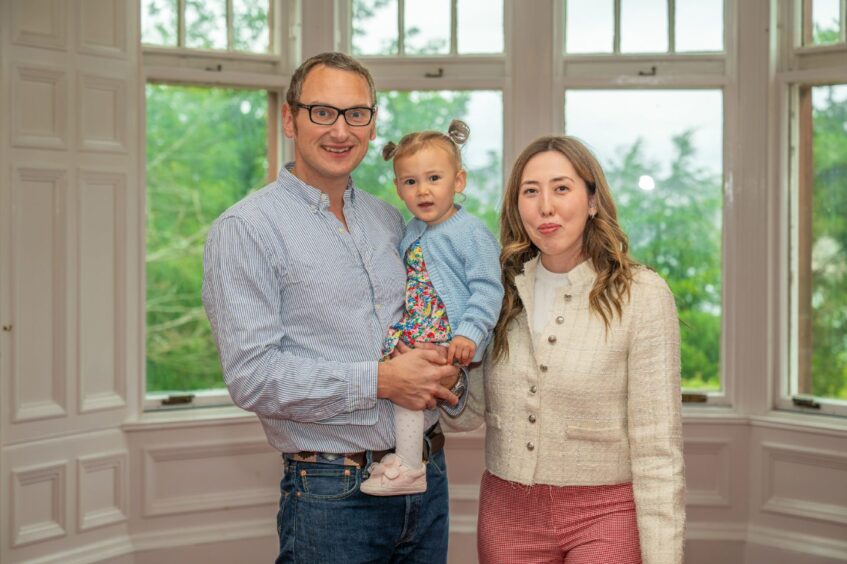 Mike with his wife Zauresh and daughter Charlotte.