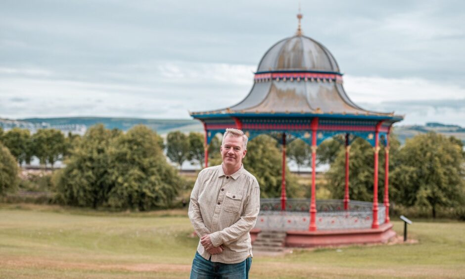 Writer and new Dundee resident Charlie Connelly on Magdalen Green with the bandstand in the background.